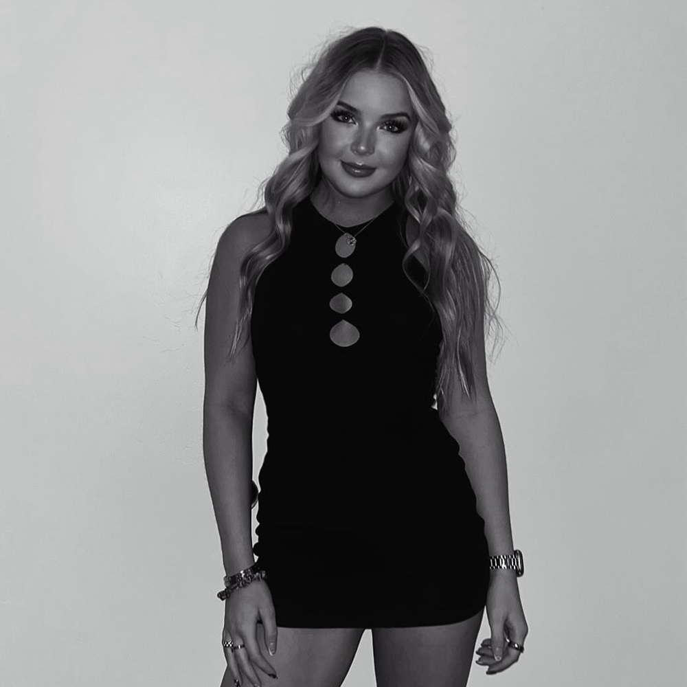 Cute black mini dress with cutouts worn once. SIZE SMALL